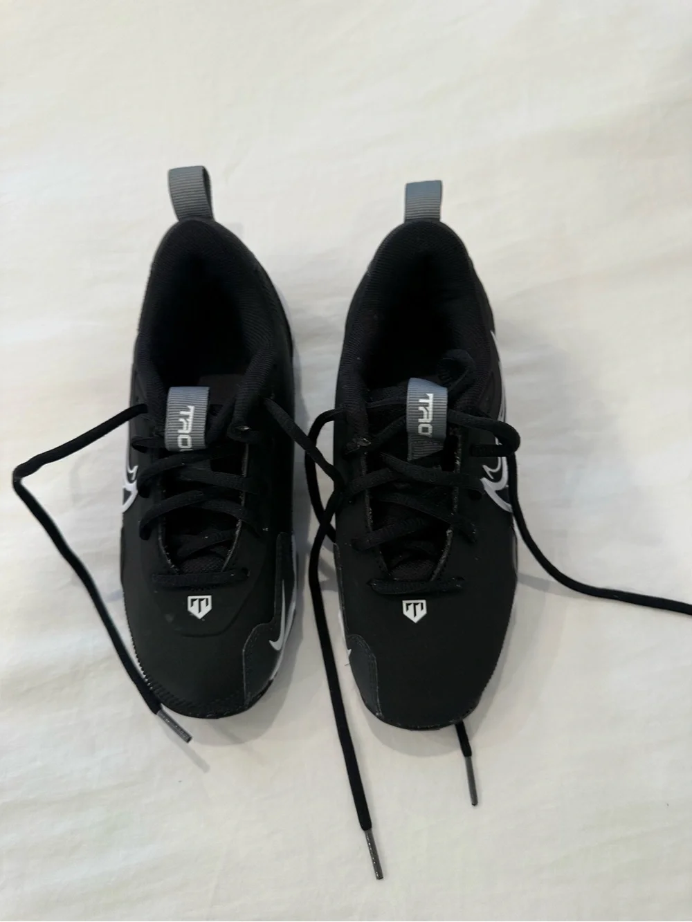 Kids Nike Black Athletic Cleats with White Accents size 1 like new